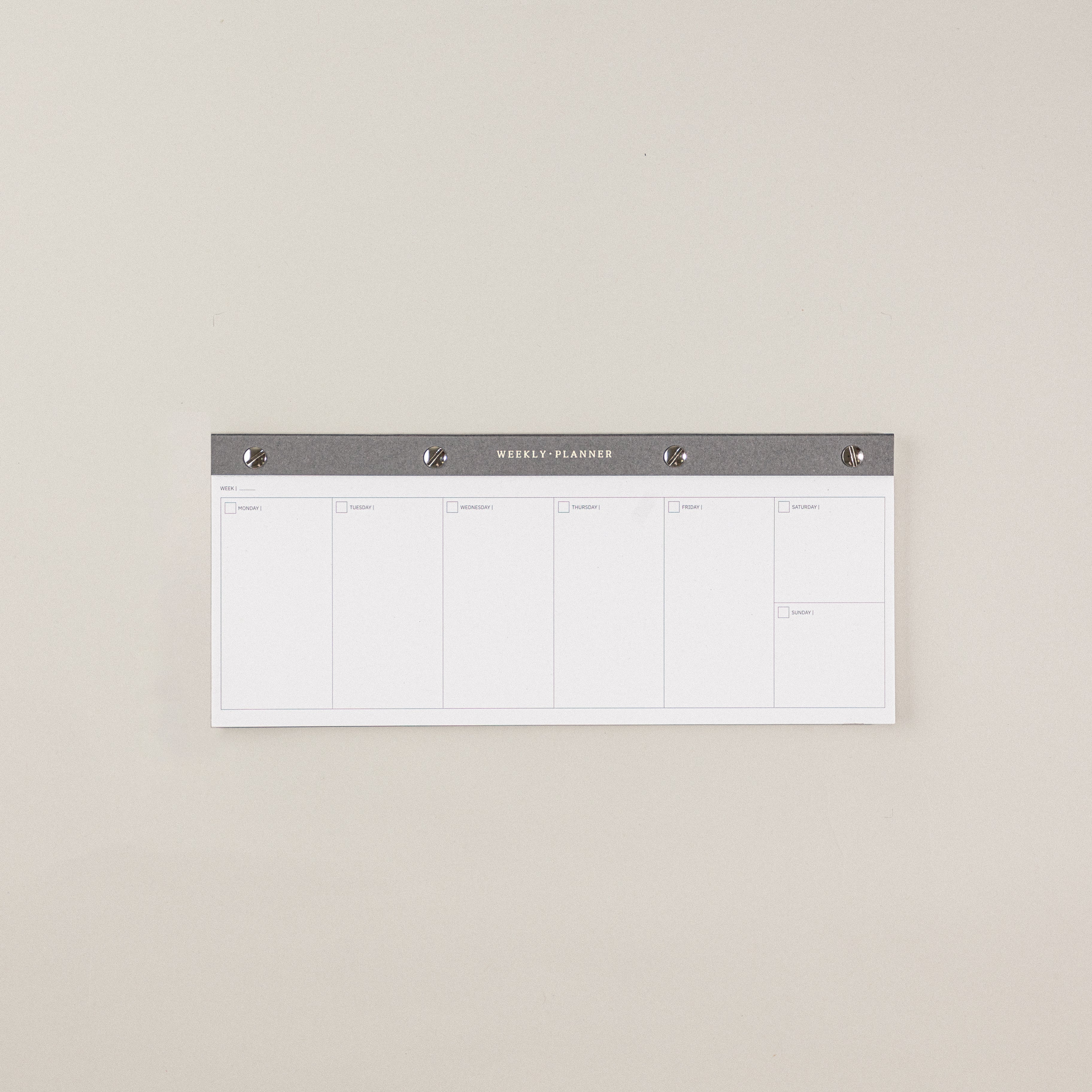 Planificador de bloc semanal, para planear tu semana en una libreta panorámica o formato panorámico con diseño elegante y materiales sostenibles.
