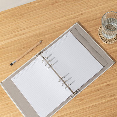 Recambio de papel reciclable con hojas pautadas