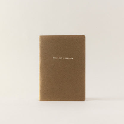 Pequeña libreta de notas de papel de avellanas
